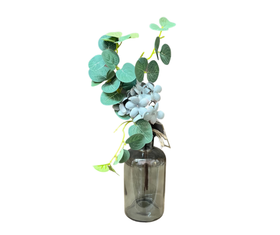 Eucalyptus and Green Flowers In Vases